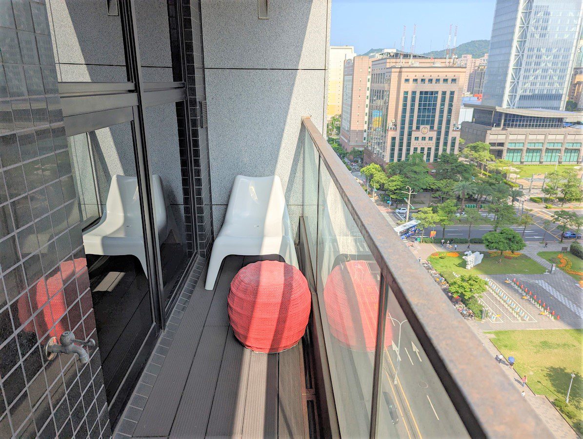 Taipei studio apartment outdoor balcony view with a chair
